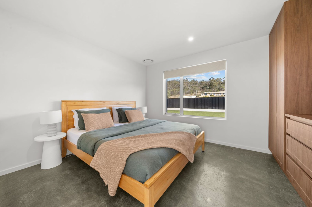 Sage and timber bedroom