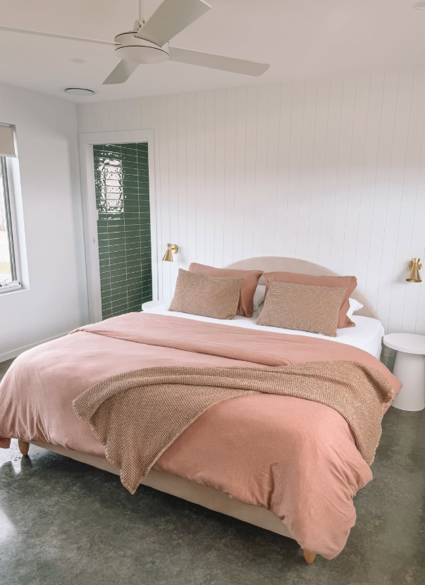 Warm blush bedroom with garden outlook